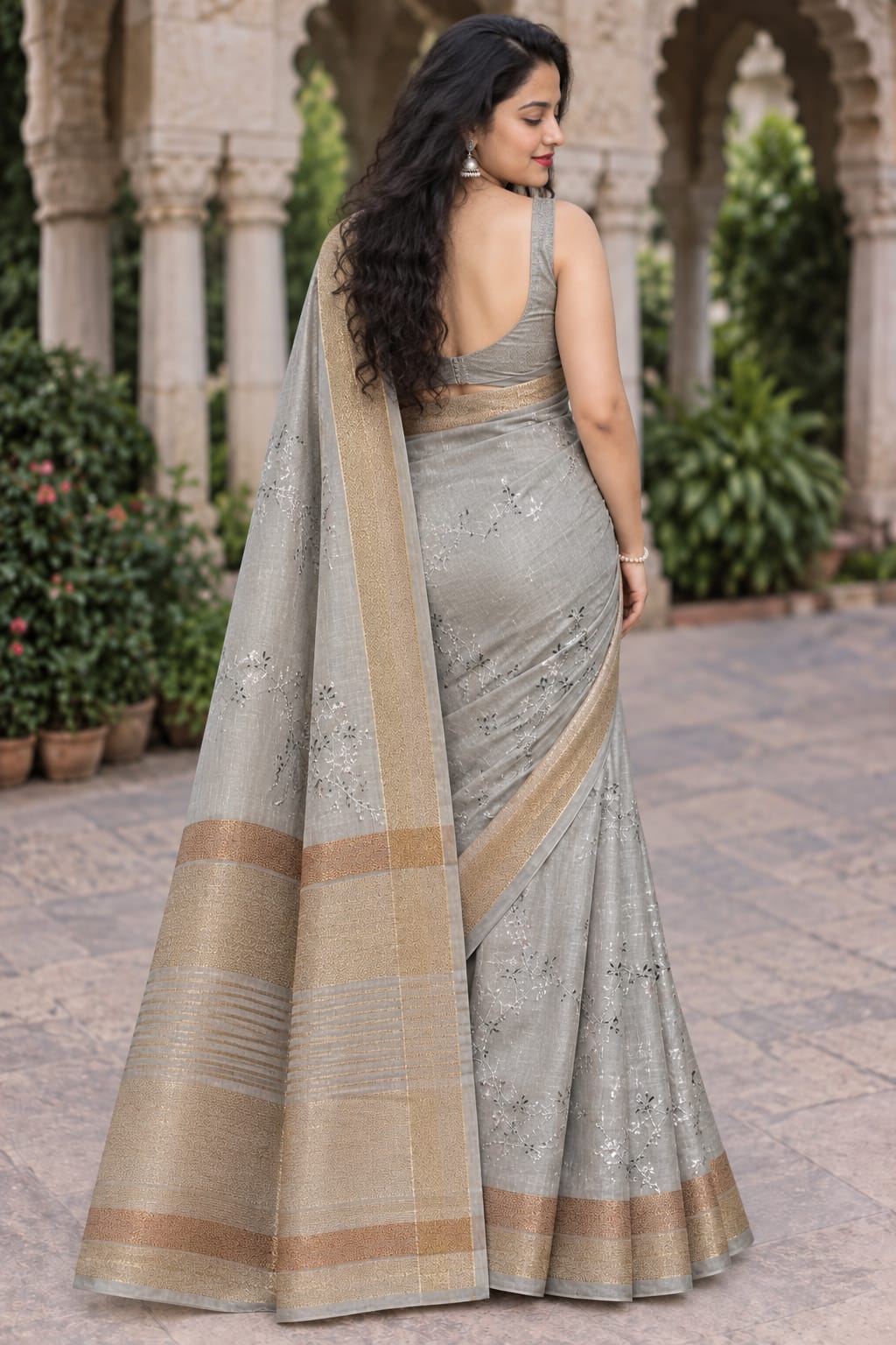 Mahi An elegance featuring soft colours, delicate gotapatti embroidery, and luxurious zari borders